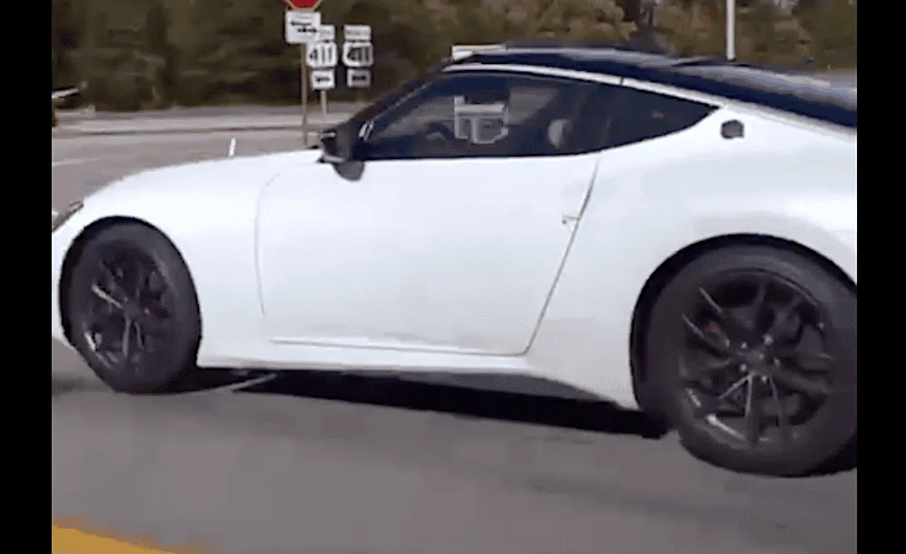 everest-white-2023-nissan-z-spied-testing-3.webp