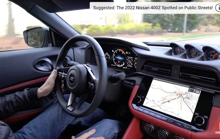 Video: 2023 Nissan Z Ride Along w/ Black Interior (Manual Transmission). Passion Red & Boulder Grey Z