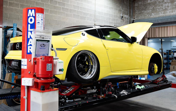 My Z Proto on MCA Suspension Reds, with Stanceparts Air Cups and 1" drop