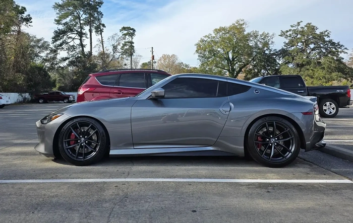 SILVER COILOVERS INSTALLED.  GAME CHANGER 1,INCH IN FRONT 3/4 INCH IN BACK.